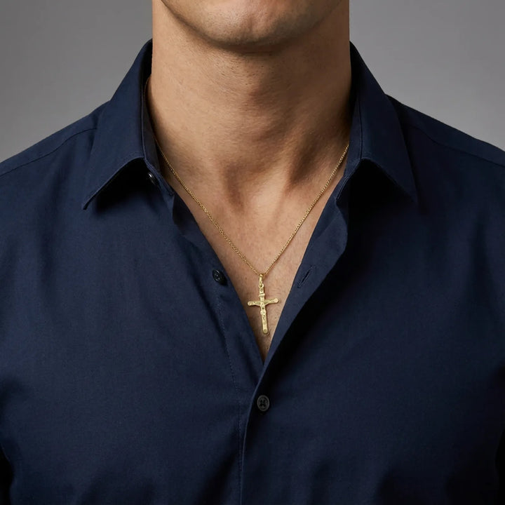 Tubular Crucifix Yellow Gold Cross Pendant worn on mens chest