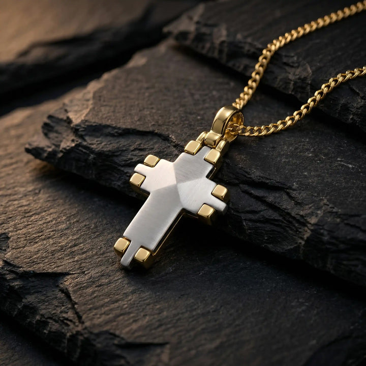 Modern Latin Two-Tone Gold Cross Pendant on stone
