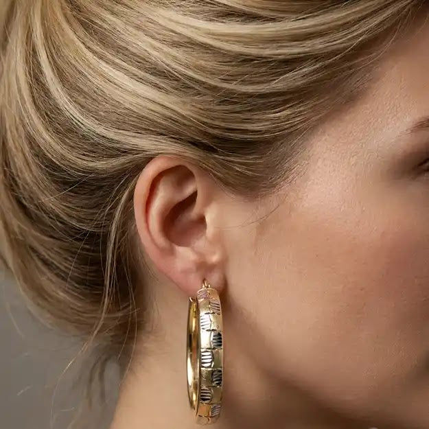 Two Tone Fancy Oval Hoop Earrings, 19.1mm - worn on ear
