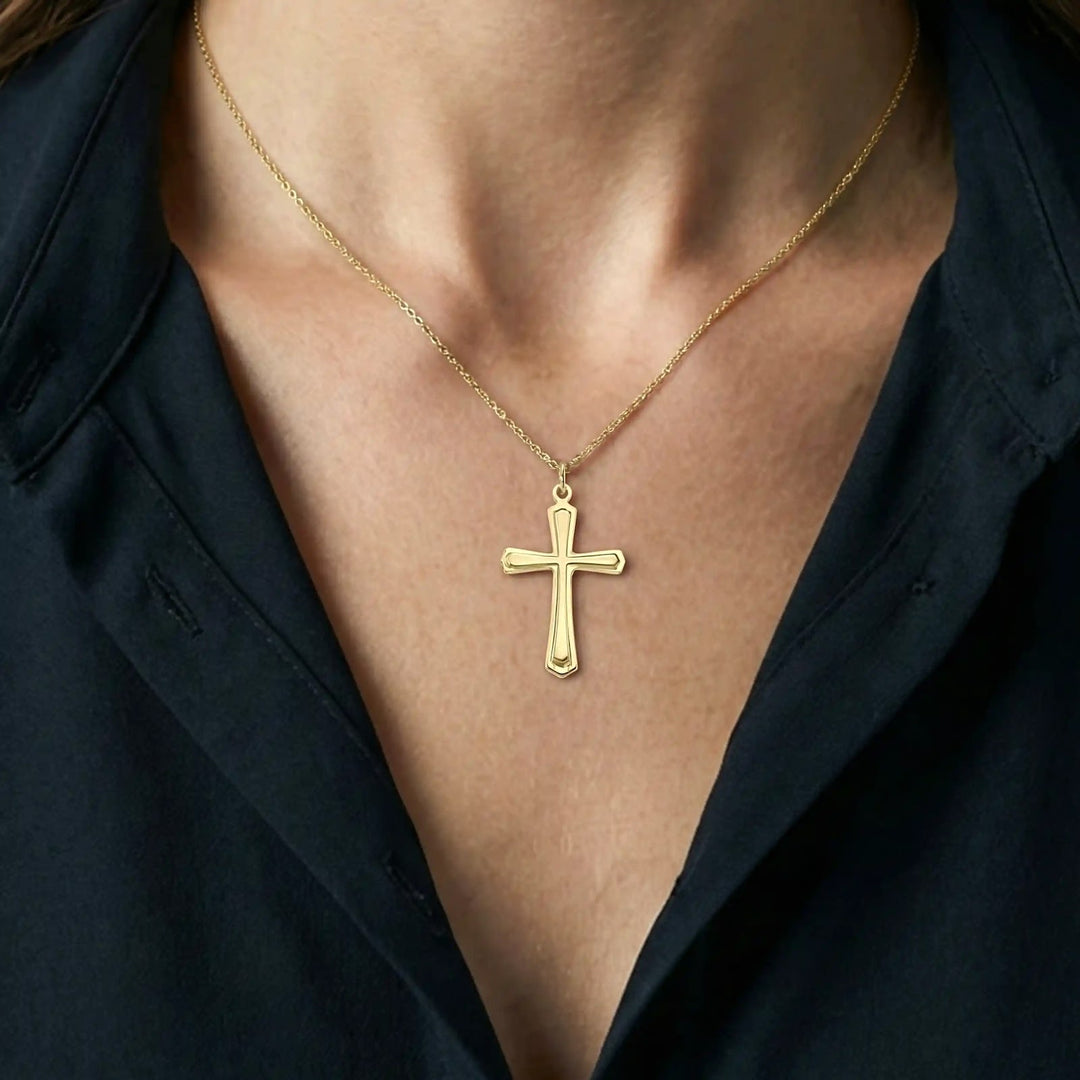 Layered Latin Yellow Gold Cross Pendant worn on womens chest