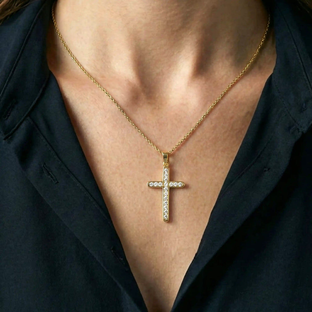 Channel-Set Latin Yellow Gold Cross Pendant worn on womens chest