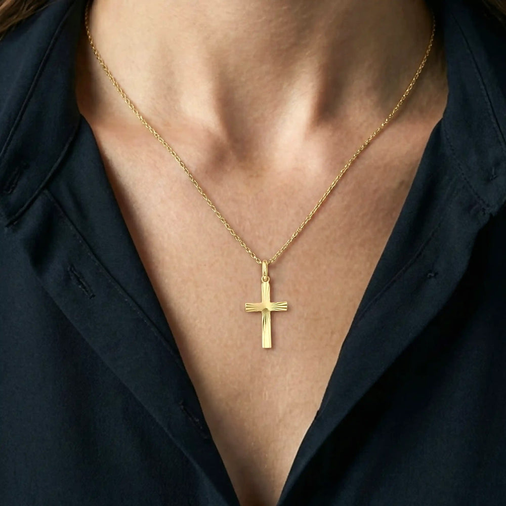 Sunburst Latin Yellow Gold Cross Pendant worn on womens chest