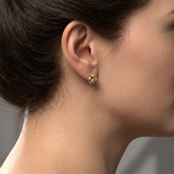 Yellow Gold Love Knot Stud Earrings - worn on ear