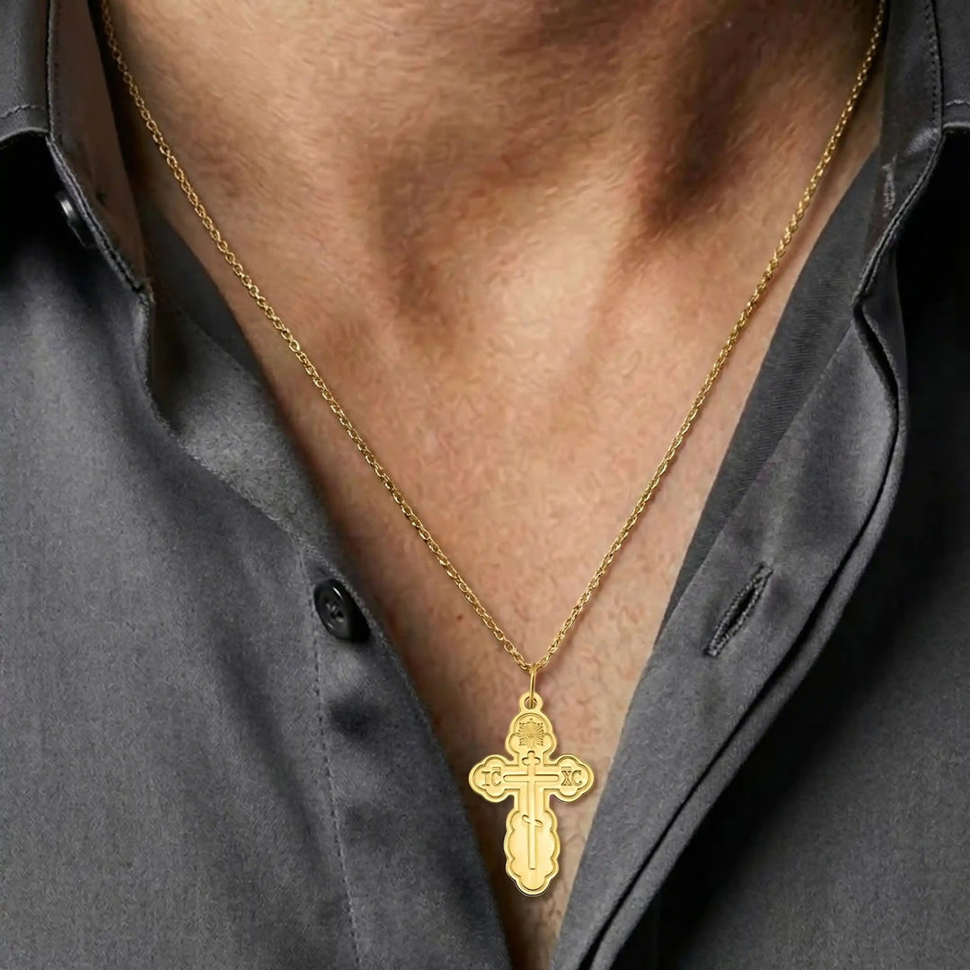Three-Bar Orthodox Yellow Gold Cross Pendant worn on mens chest