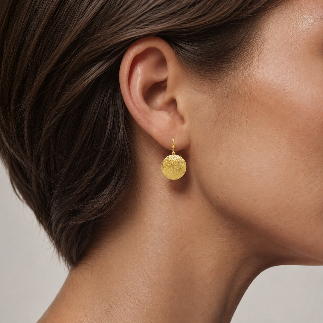 Yellow Gold Textured Disc Earrings - worn on ear