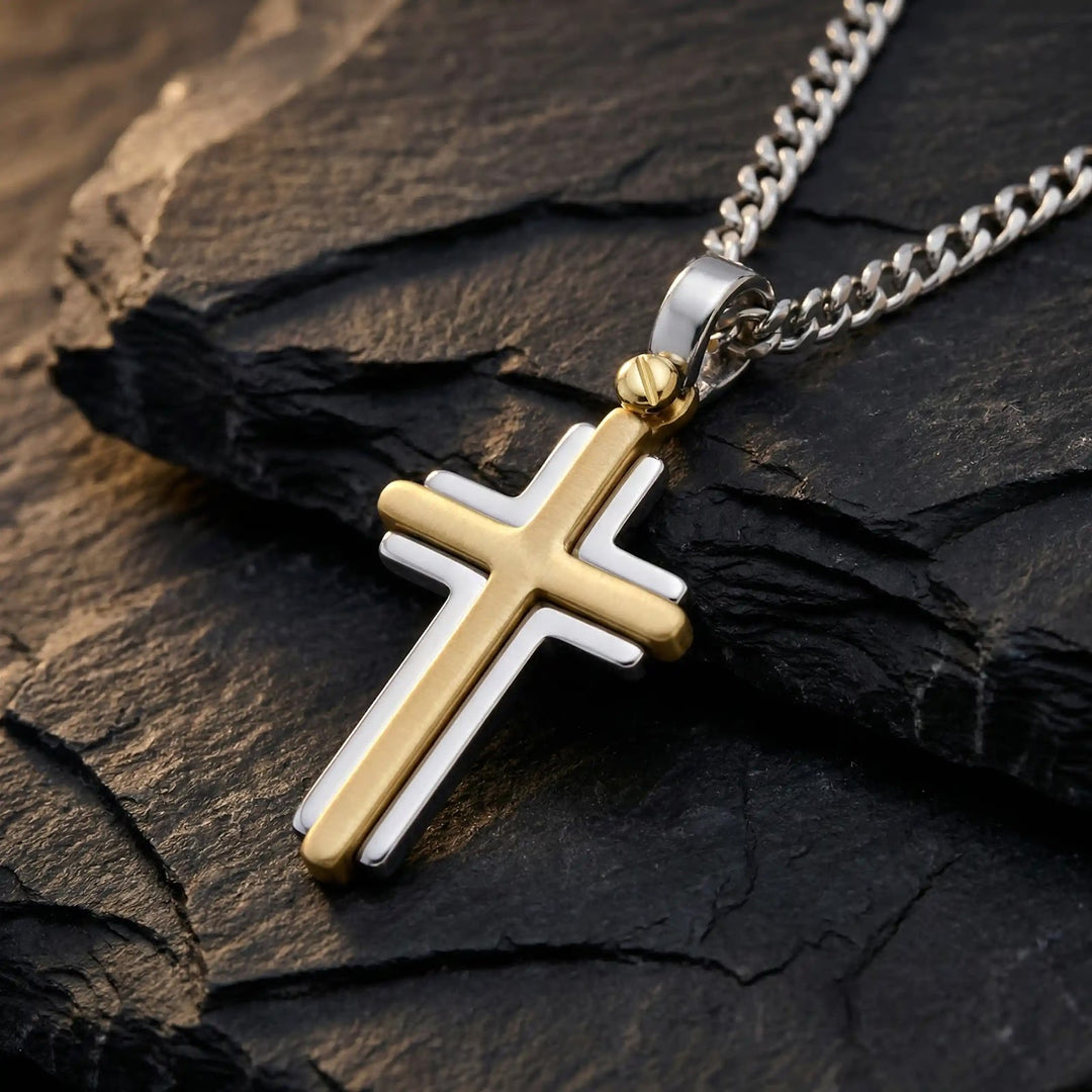 Two-Tone Latin Two-Tone Gold Cross Pendant on stone