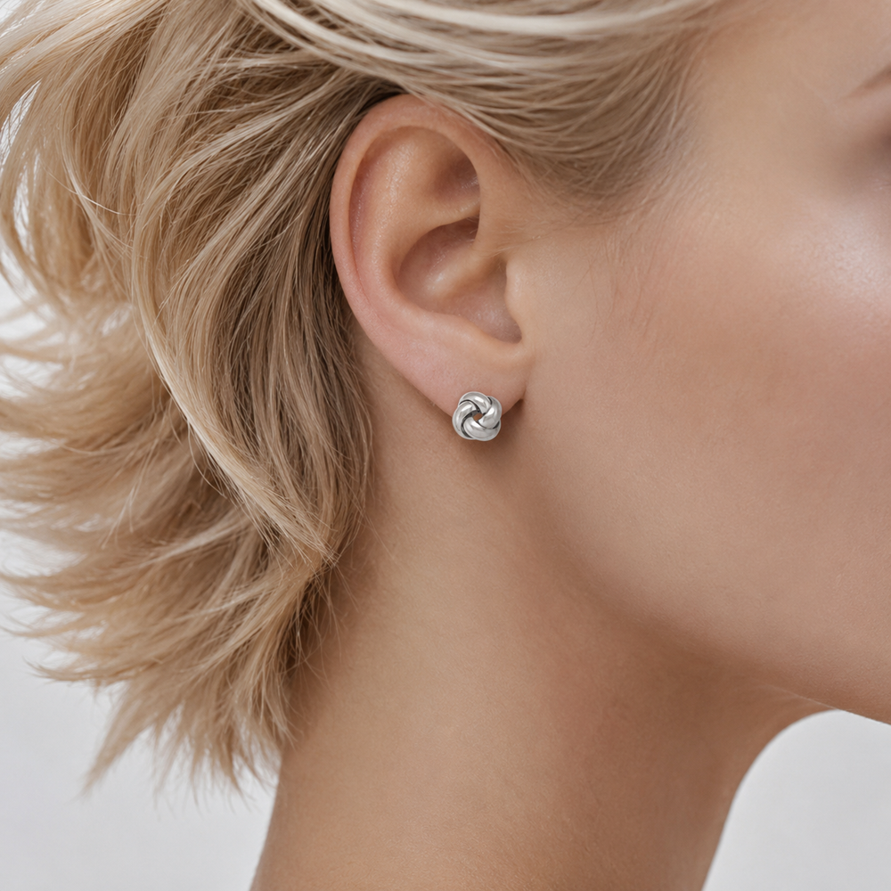 Yellow Gold Love Knot Earrings - worn on ear