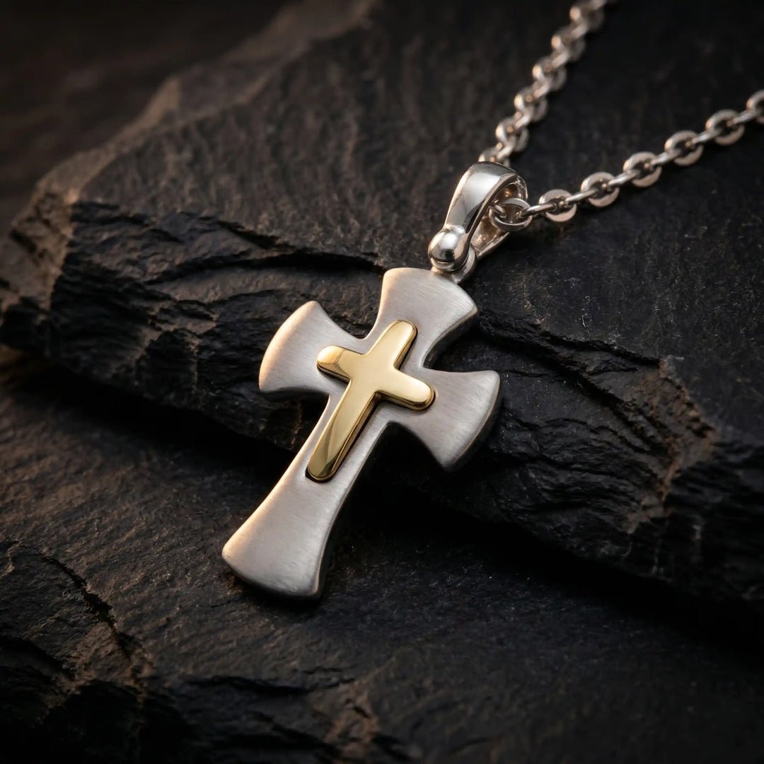 Flared Latin Two-Tone Gold Cross Pendant on stone