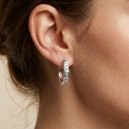 White Gold CZ Huggie Hoop Earrings, 13mm - worn on ear