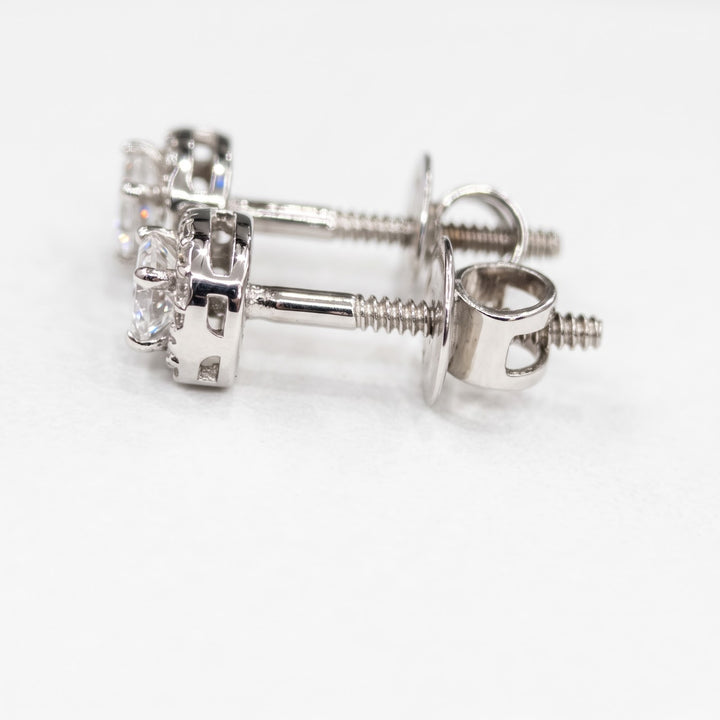 Side view of the 10k white gold lab diamond halo studs with screw-backs