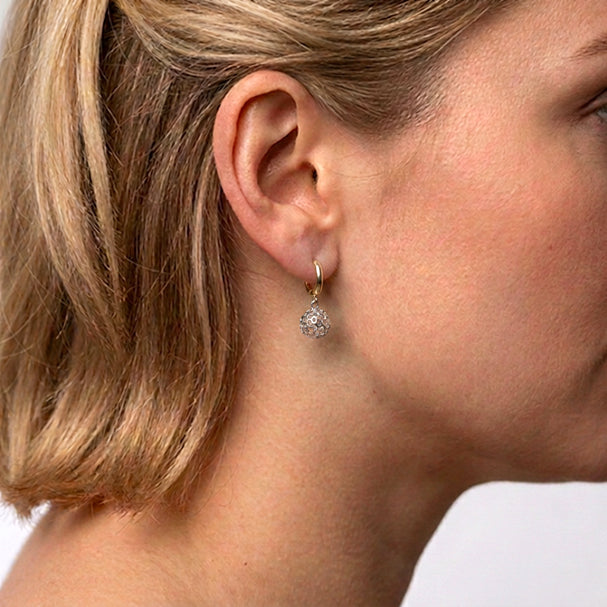 Two Tone Fancy Diamond Cut Drop Ball Earrings - worn on ear