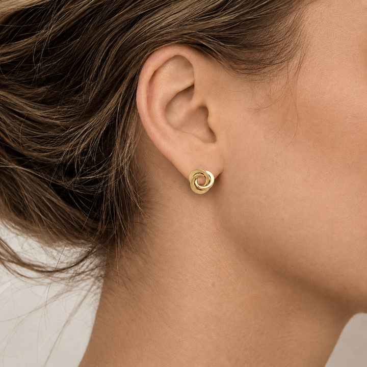 Yellow Gold Love Knot Stud Earrings - worn on ear