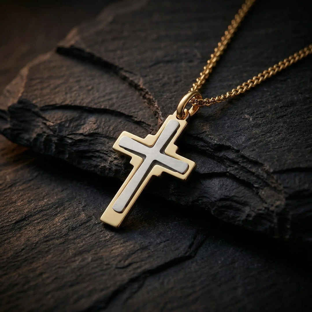 Layered Latin Two-Tone Gold Cross Pendant on stone