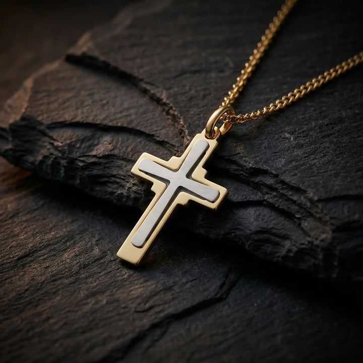 Layered Latin Two-Tone Gold Cross Pendant on stone