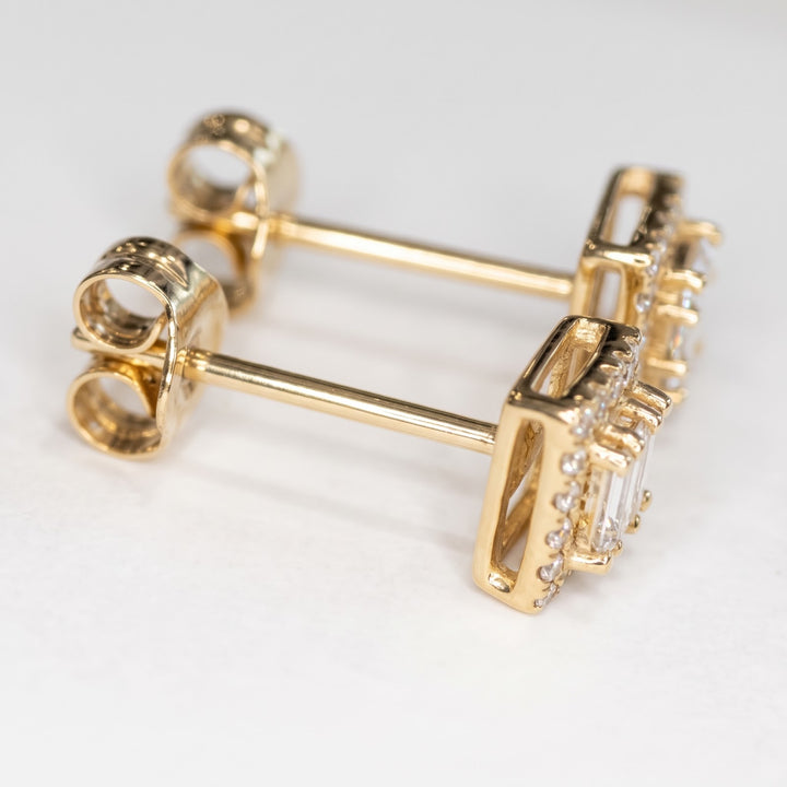 Side view of the 14k yellow gold studs, posts and open backs