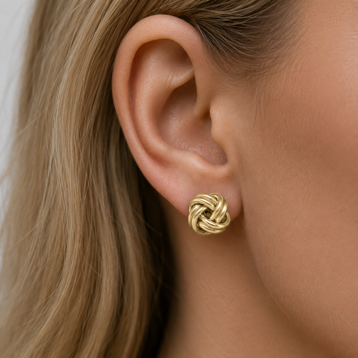 Yellow Gold Love Knot Stud Earrings - worn on ear