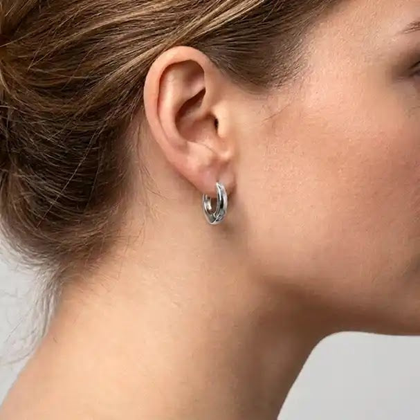White Gold Oval Huggie Earrings - worn on ear