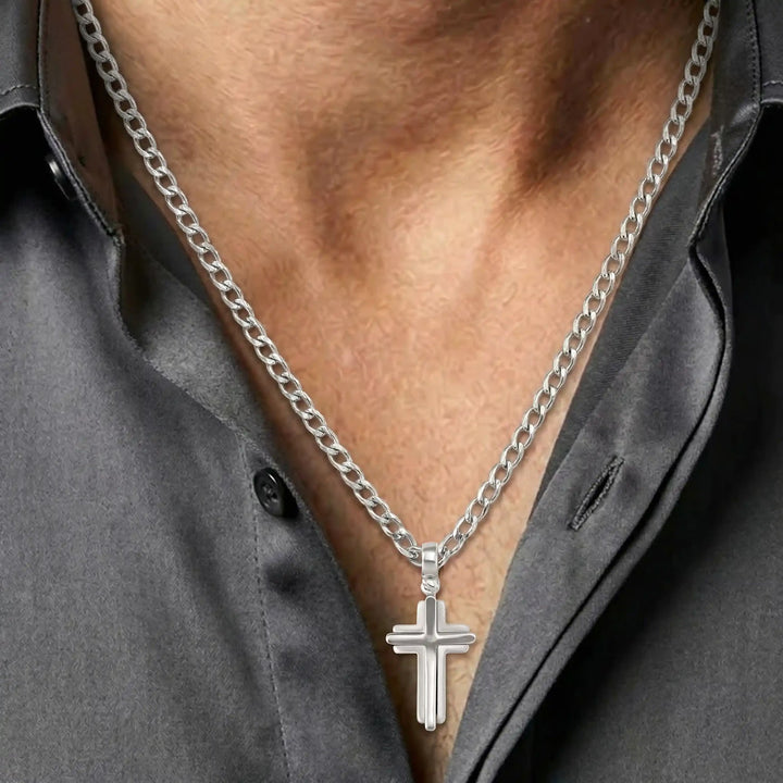 Layered Latin White Gold Cross Pendant worn on mens chest