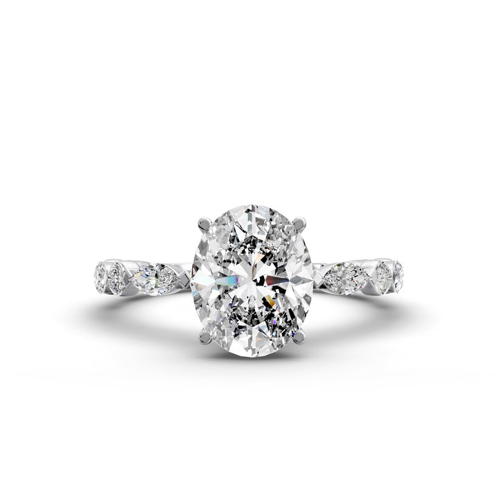 Oval hidden halo engagement ring with alternating marquise and round diamond band shown in studio lighting
