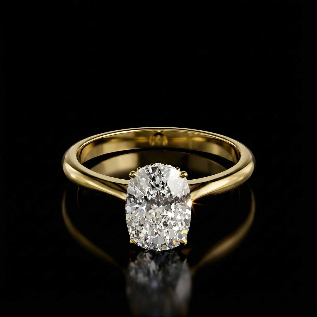 Elongated cushion diamond hidden halo cathedral engagement ring shown on display.
