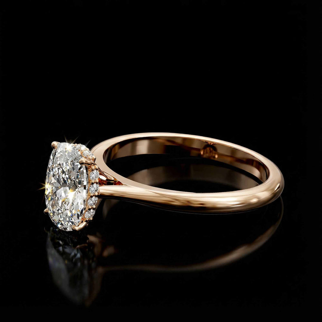Elongated cushion diamond hidden halo cathedral engagement ring shown on display.
