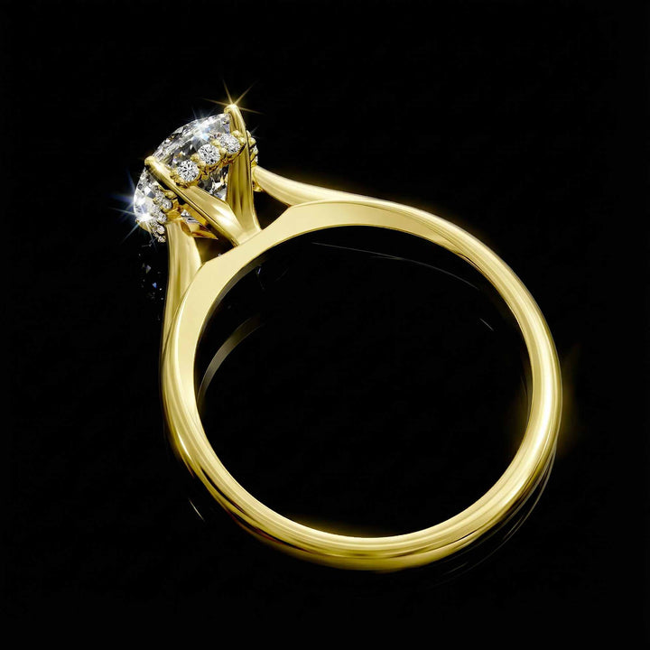 Elongated cushion diamond hidden halo cathedral engagement ring shown on display.