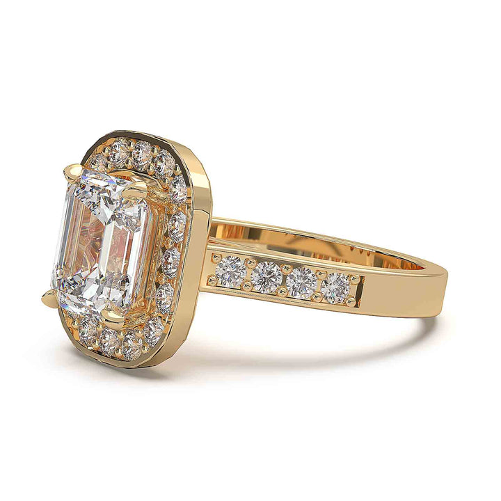 Cathedral-style emerald cut diamond ring with halo and channel-set diamond band, 2.3 carat