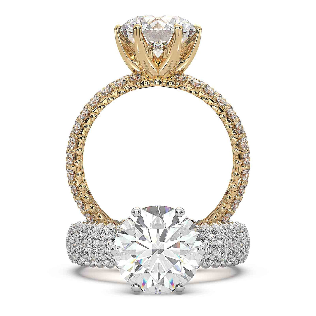 2.5 carat round diamond engagement ring with three rows of accent diamonds.