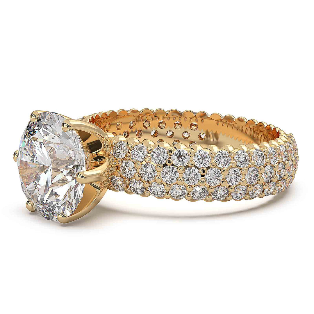 2.5 carat round diamond engagement ring with three rows of accent diamonds.