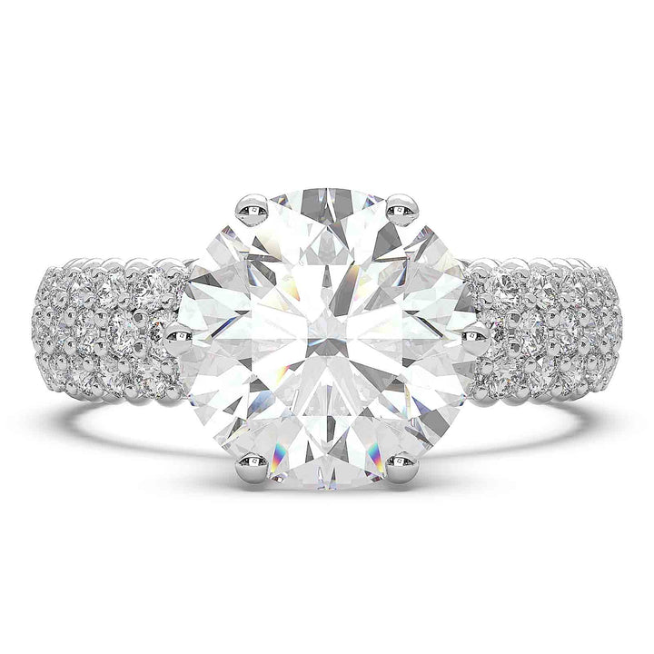 2.5 carat round diamond engagement ring with three rows of accent diamonds.