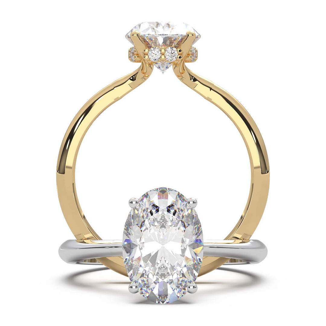 Oval lab-grown diamond ring with VVS1 clarity and D color, set in 18k gold with hidden halo.