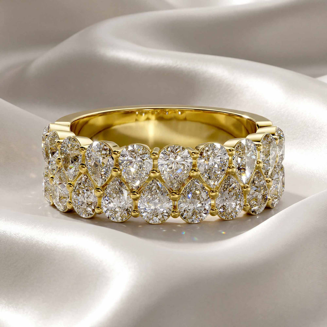 2.6 carat total round lab-grown diamond double row wedding band displayed on silk fabric.