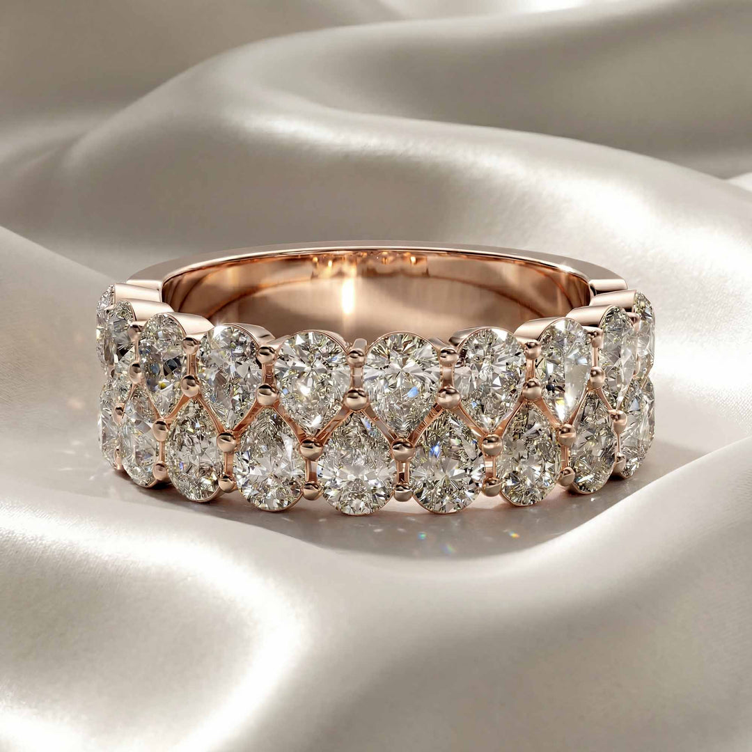 2.6 carat total round lab-grown diamond double row wedding band displayed on silk fabric.