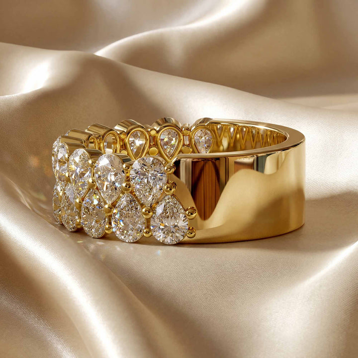 2.6 carat total round lab-grown diamond double row wedding band displayed on silk fabric.