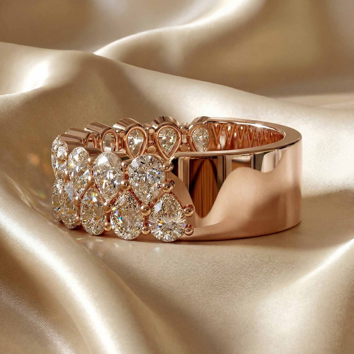 2.6 carat total round lab-grown diamond double row wedding band displayed on silk fabric.