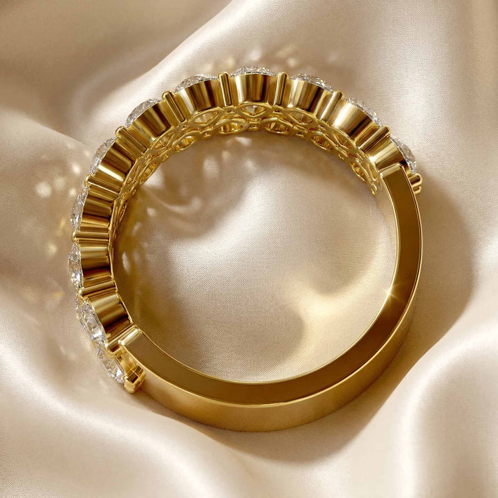 2.6 carat total round lab-grown diamond double row wedding band displayed on silk fabric.