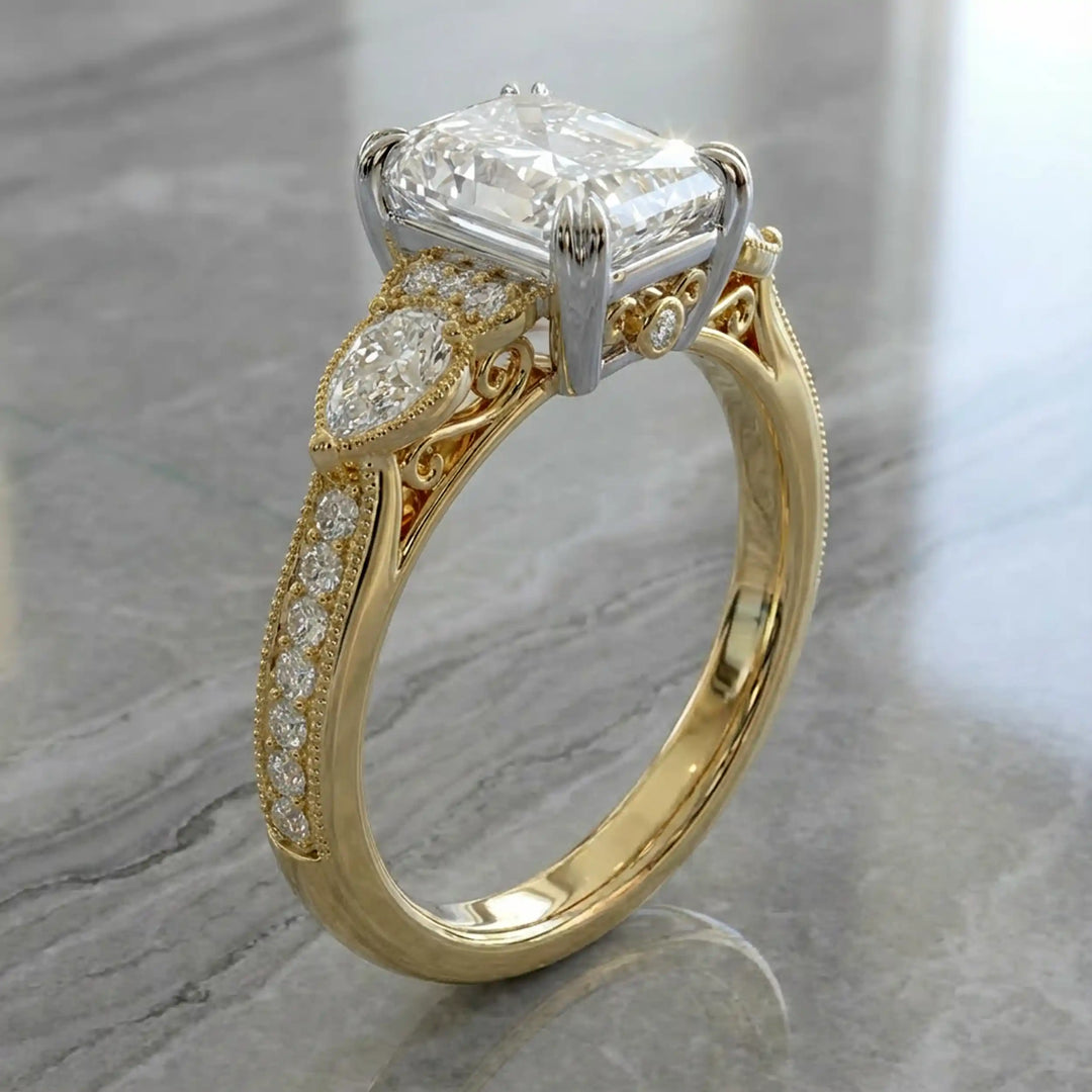 Radiant lab-grown diamond engagement ring with pear side stones displayed on ring stand.
