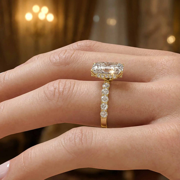 Radiant diamond hidden halo engagement ring with diamonds on band shown in display view.