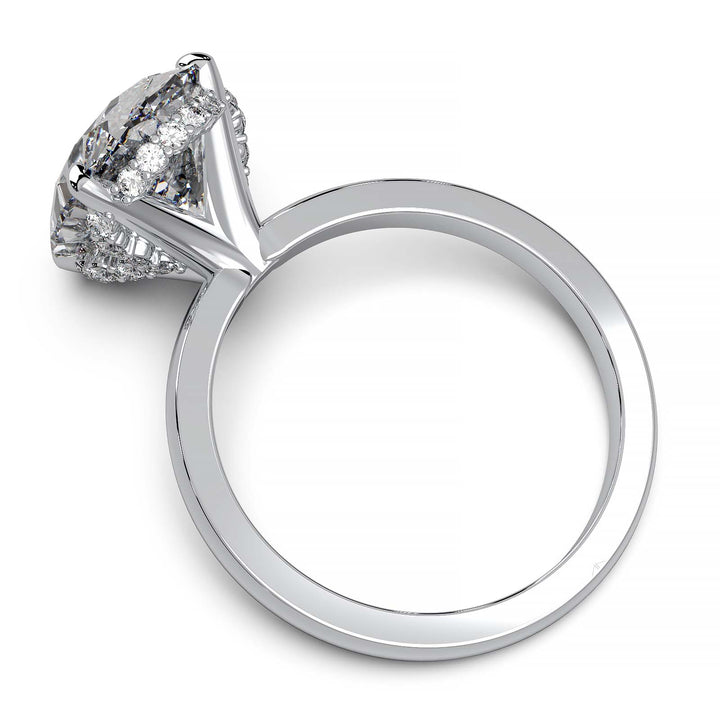 Oval lab-grown diamond engagement ring with hidden halo and low-profile setting.