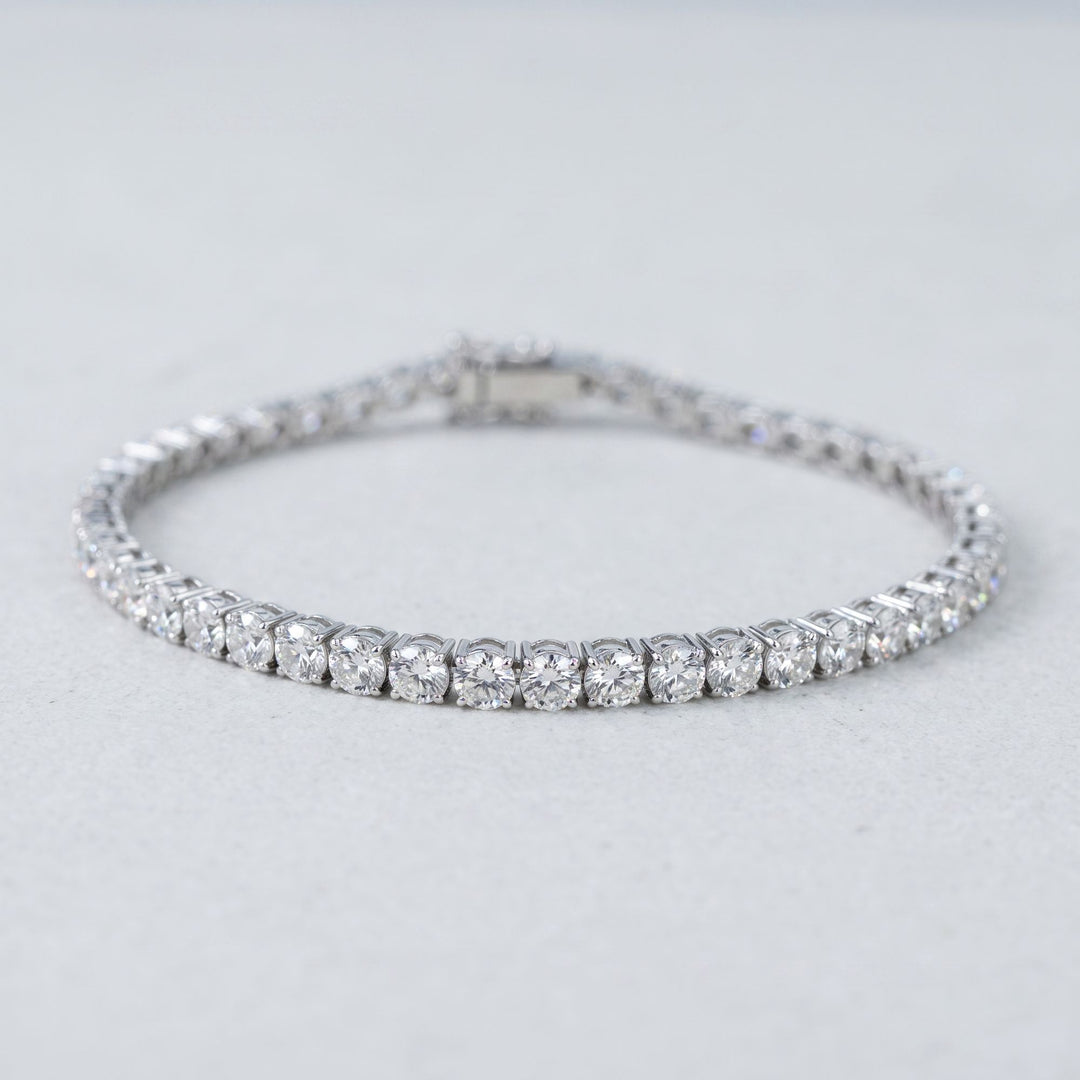 Round lab-grown diamond tennis bracelet, oval low-angle studio view