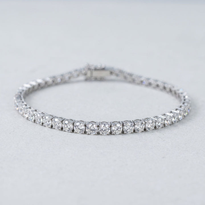 Round lab-grown diamond tennis bracelet, oval low-angle studio view
