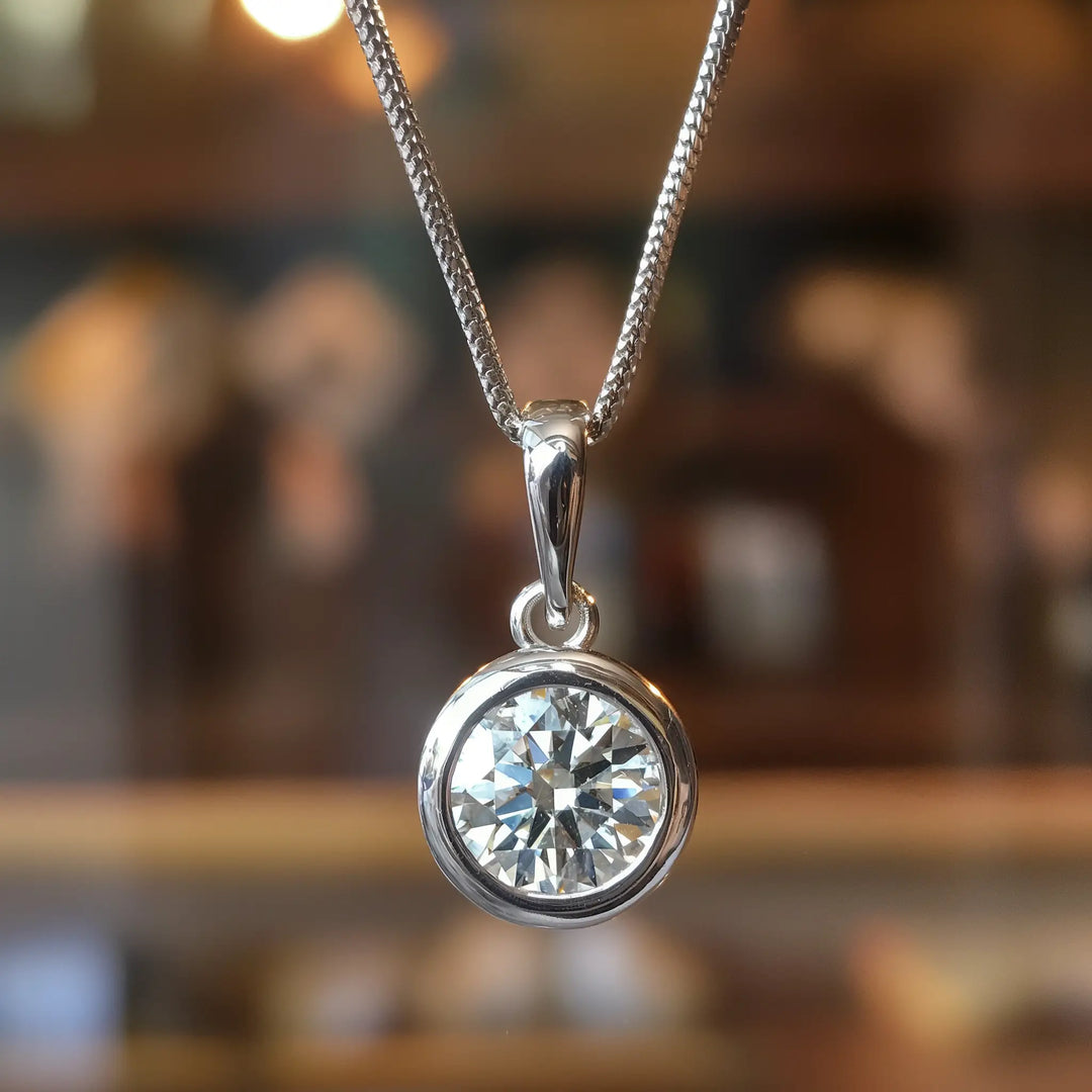 1 carat round lab-grown diamond solitaire bezel pendant with bale