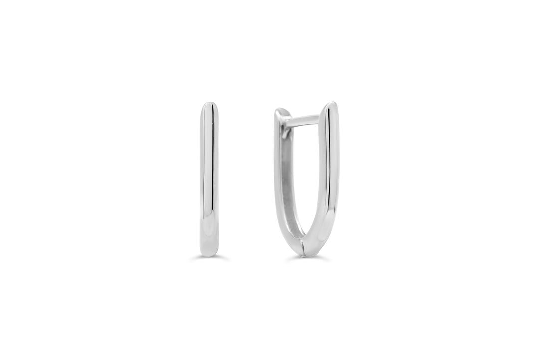 10k white gold oval hoop earrings with a polished finish and secure snap-back closure.