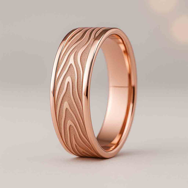 7mm flat gold wedding band with Mokume wood-grain textured matte center and polished edges
