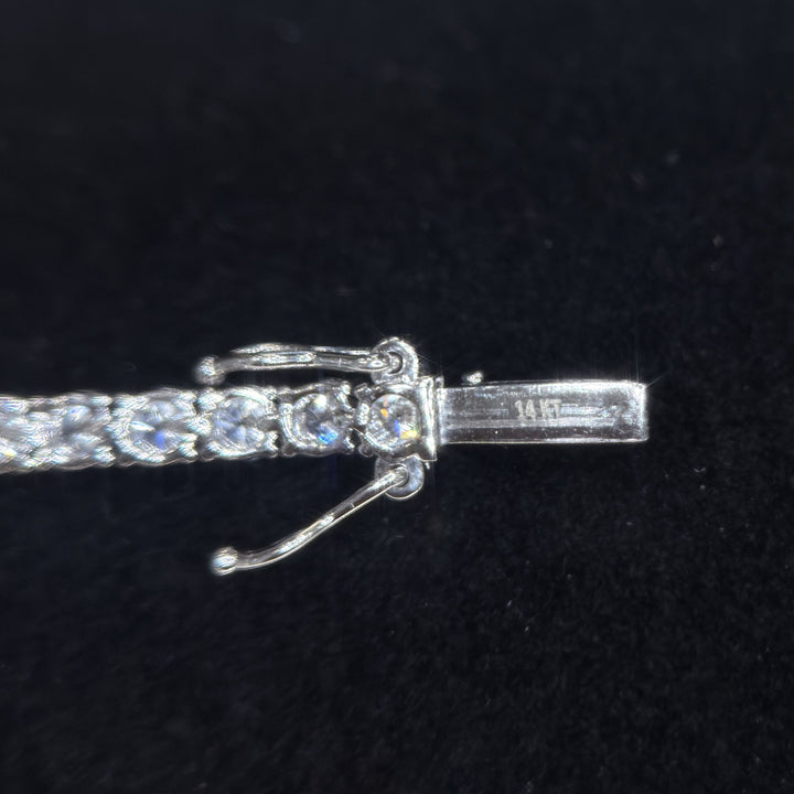 14KT hallmark on the tennis bracelet clasp tongue