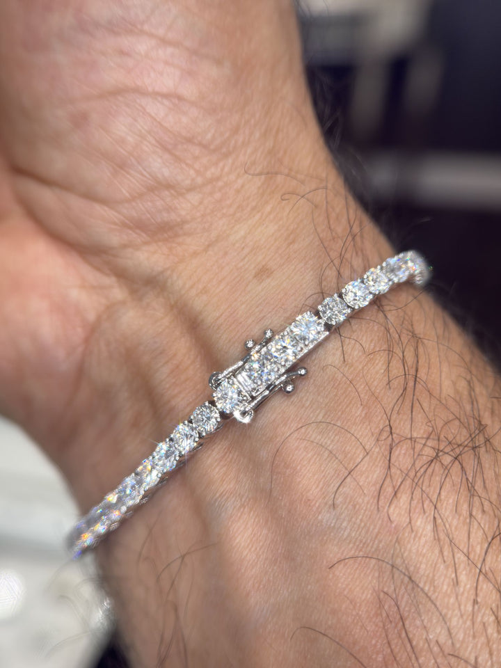 Round lab-grown diamond tennis bracelet shown on a man’s wrist