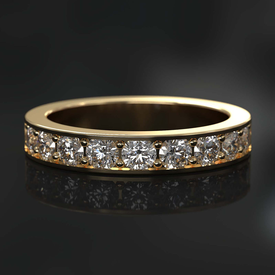 Channel set half eternity wedding band with diamonds.