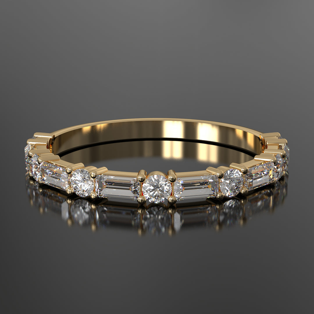 Lab-grown diamond wedding band with baguette and round stones in shared prong setting.