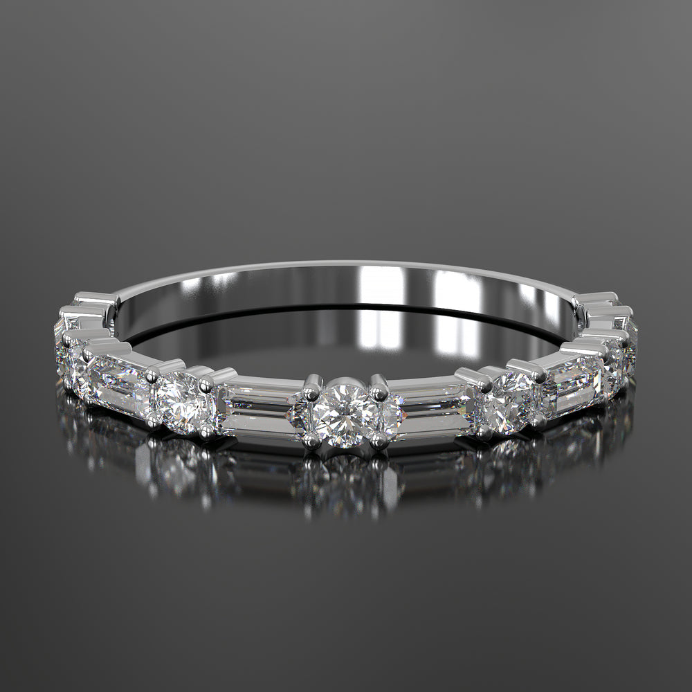 Lab-grown diamond wedding band with baguette and round stones in shared prong setting.