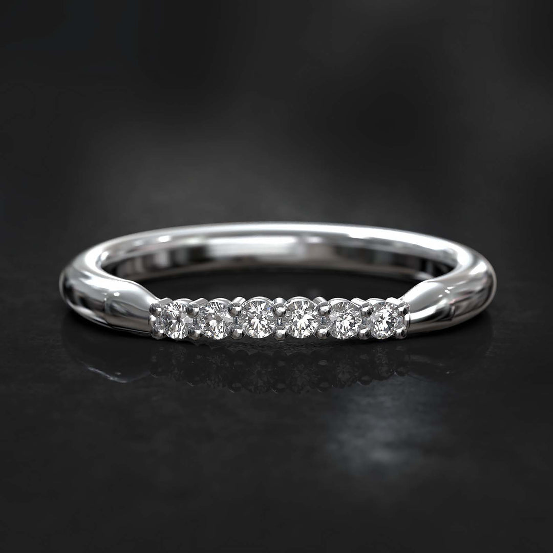 Round-profile band with six sparkling lab-grown diamonds on top, featuring a subtle curve and thicker design.